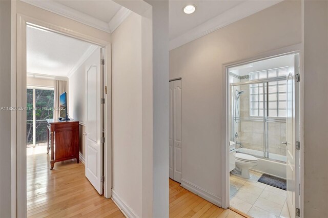 21235 NE 33rd Ave, Aventura, FL 33180 - hall with ornamental molding and light wood-style floors