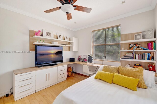 21235 NE 33rd Ave, Aventura, FL 33180 - bedroom featuring ornamental molding, light wood-type flooring, built in study area, and ceiling fan