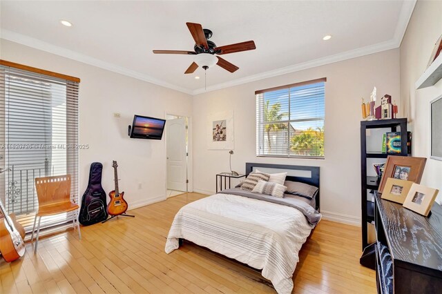 21235 NE 33rd Ave, Aventura, FL 33180 - bedroom featuring light wood finished floors, crown molding, recessed lighting, and a ceiling fan