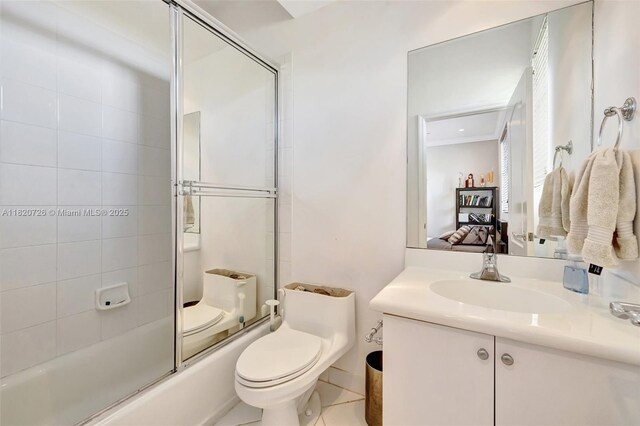 21235 NE 33rd Ave, Aventura, FL 33180 - full bathroom featuring vanity, combined bath / shower with glass door, and connected bathroom