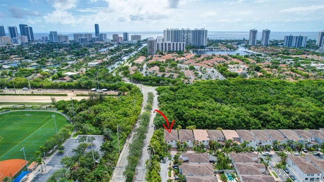 21235 NE 33rd Ave, Aventura, FL 33180 - aerial view of city skyline and a nearby body of water