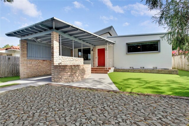 2305 SW 19th Ter, Miami, FL 33145 - view of front of property featuring crawl space and stucco siding