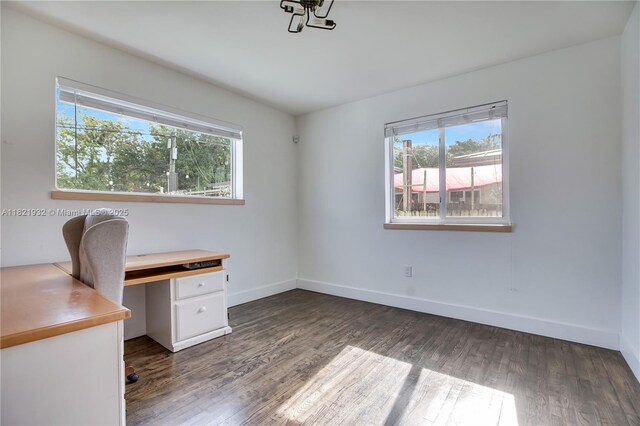 2305 SW 19th Ter, Miami, FL 33145 - unfurnished office featuring plenty of natural light and wood finished floors
