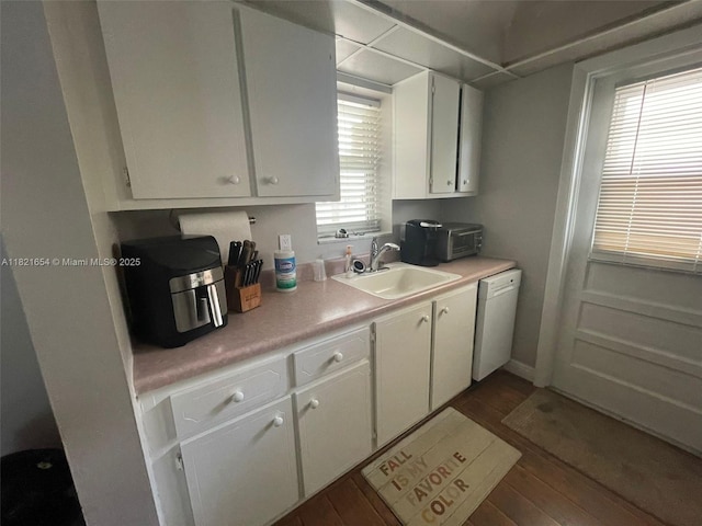 415 NE 2nd St Unit 223, Hallandale Beach, FL 33009 - kitchen featuring dishwasher, dark wood-style floors, white cabinetry, and light countertops