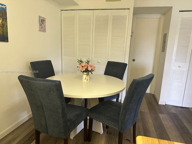 6447 Chasewood Dr Unit C, Jupiter, FL 33458 - dining space featuring baseboards and dark wood finished floors