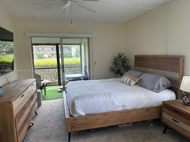 6447 Chasewood Dr Unit C, Jupiter, FL 33458 - bedroom with carpet floors, access to outside, and a ceiling fan