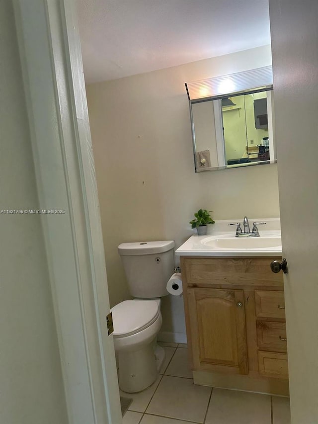 6447 Chasewood Dr Unit C, Jupiter, FL 33458 - bathroom featuring tile patterned flooring and vanity