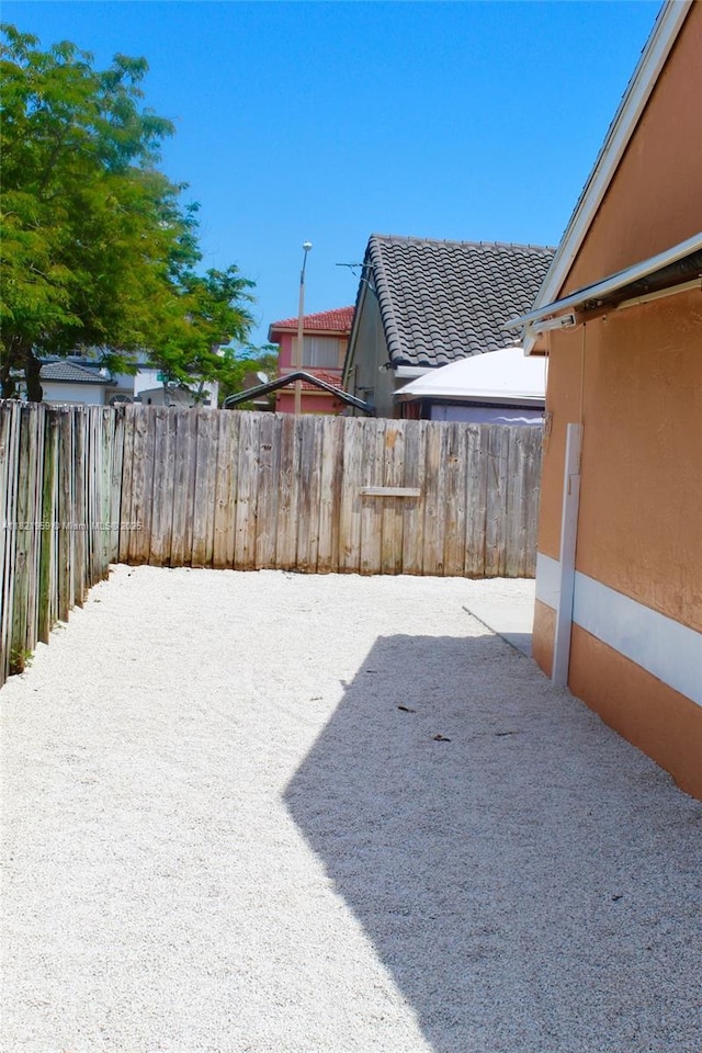 1061 SE 13th Ave Unit 1061, Homestead, FL 33035 - view of yard featuring a patio area