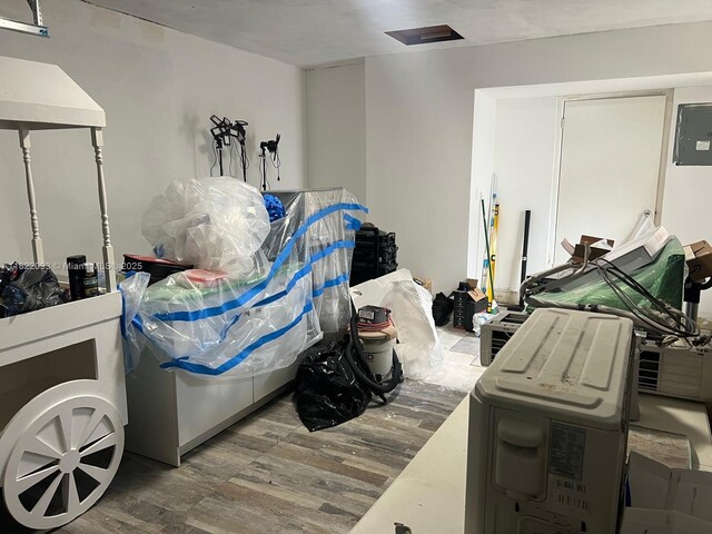 7110 SW 11th St, Pembroke Pines, FL 33023 - bedroom with wood finished floors and electric panel