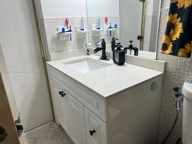 7110 SW 11th St, Pembroke Pines, FL 33023 - bathroom with vanity, marble look tile flooring, and tile walls