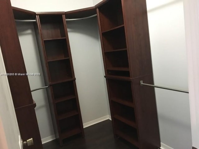 15270 SW 30th Ter, Miami, FL 33185 - walk in closet featuring dark wood-style floors