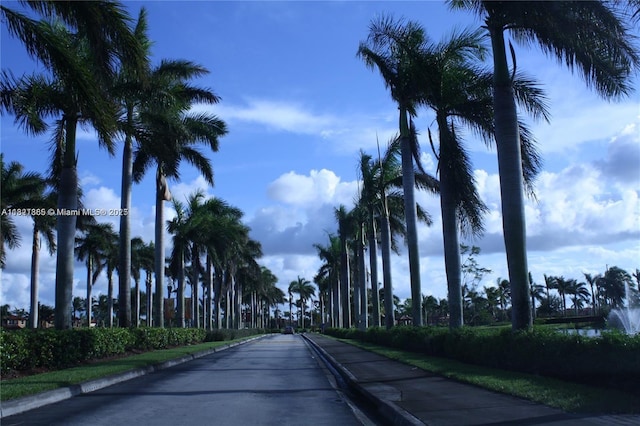 15270 SW 30th Ter, Miami, FL 33185 - view of asphalt road with sidewalks and curbs