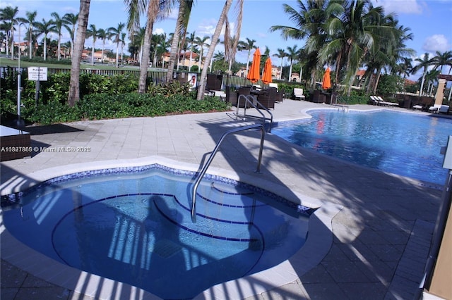 15270 SW 30th Ter, Miami, FL 33185 - community pool with a patio area