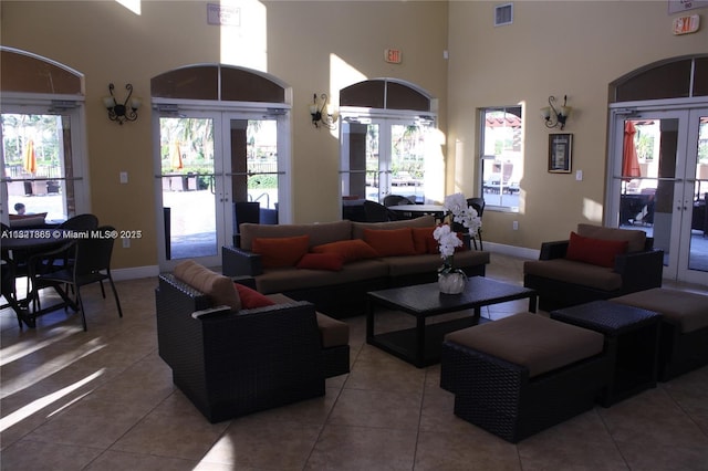 15270 SW 30th Ter, Miami, FL 33185 - tiled living area featuring french doors and a high ceiling