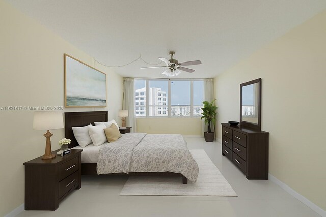 11 Island Ave Unit 1410, Miami Beach, FL 33139 - bedroom with ceiling fan and baseboards