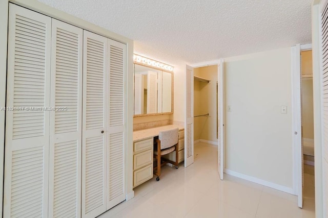 11 Island Ave Unit 1410, Miami Beach, FL 33139 - corridor with a textured ceiling and a desk