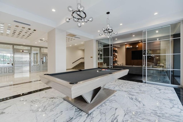 11 Island Ave Unit 1410, Miami Beach, FL 33139 - playroom with marble tiled floors, billiards table, recessed lighting, and a chandelier