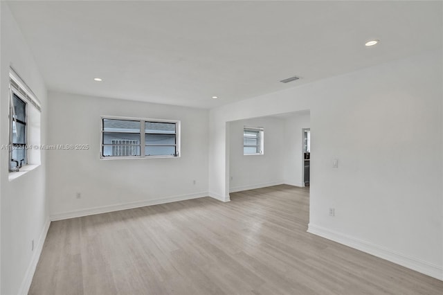 539 E 30th St, Hialeah, FL 33013 - empty room with light wood-style floors and recessed lighting