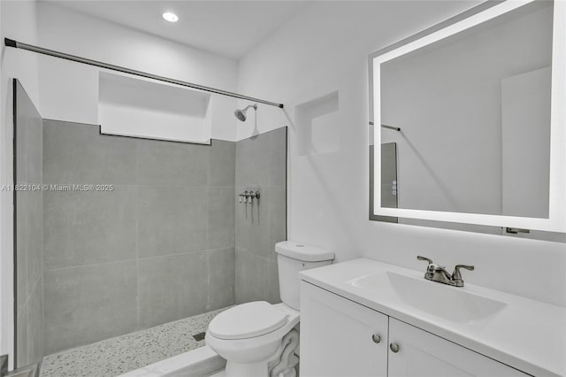 539 E 30th St, Hialeah, FL 33013 - bathroom with vanity, a tile shower, and recessed lighting