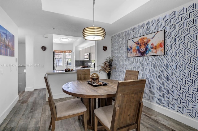 8940 NE 8th Ave Unit 1203, Miami, FL 33138 - dining space featuring wood finished floors