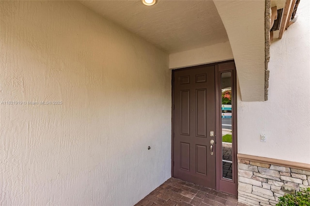 3809 Aspen Leaf Dr, Boynton Beach, FL 33436 - property entrance featuring stucco siding and stone siding