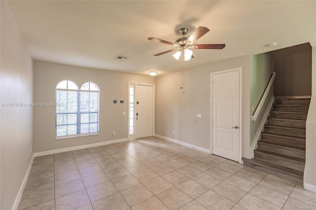 3809 Aspen Leaf Dr, Boynton Beach, FL 33436 - entrance foyer with a ceiling fan, light tile patterned floors, and stairs