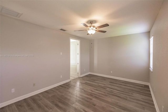3809 Aspen Leaf Dr, Boynton Beach, FL 33436 - empty room featuring a ceiling fan and dark wood-type flooring