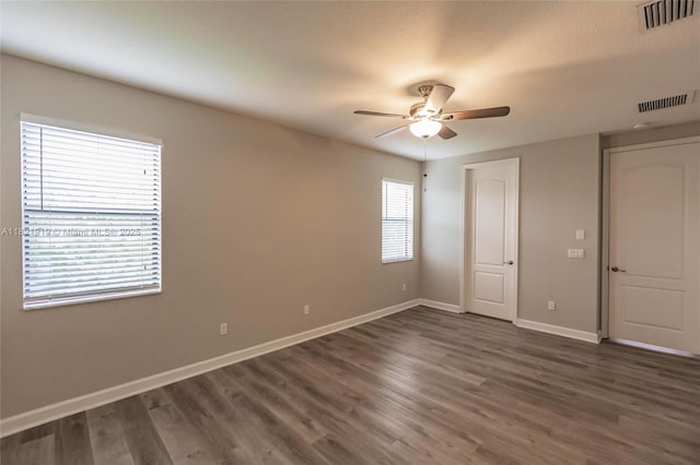3809 Aspen Leaf Dr, Boynton Beach, FL 33436 - spare room featuring ceiling fan and dark wood finished floors