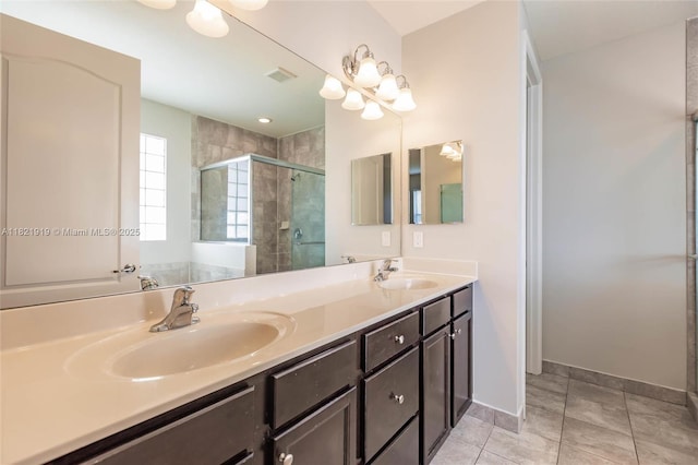 3809 Aspen Leaf Dr, Boynton Beach, FL 33436 - full bathroom featuring double vanity, a shower stall, and tile patterned floors