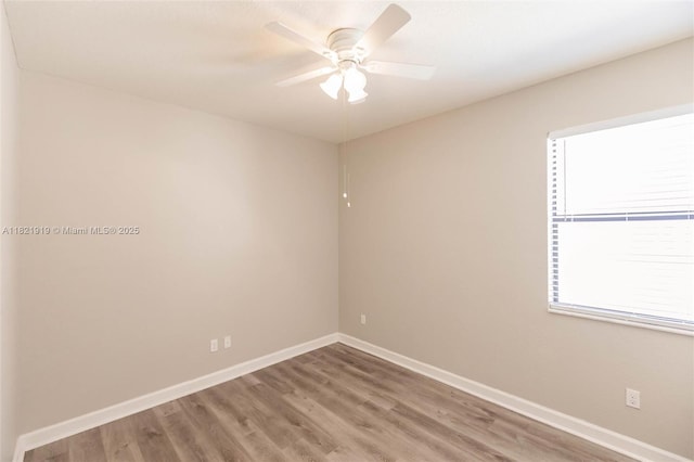 3809 Aspen Leaf Dr, Boynton Beach, FL 33436 - unfurnished room with a ceiling fan and wood finished floors