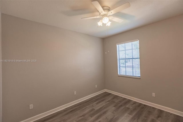 3809 Aspen Leaf Dr, Boynton Beach, FL 33436 - spare room featuring dark wood-style floors and a ceiling fan