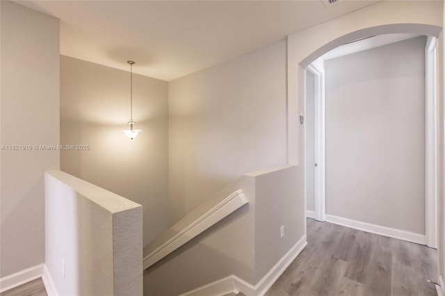 3809 Aspen Leaf Dr, Boynton Beach, FL 33436 - hall featuring arched walkways and wood finished floors