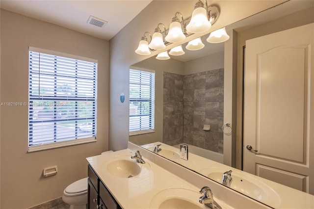 3809 Aspen Leaf Dr, Boynton Beach, FL 33436 - bathroom featuring double vanity, a chandelier, and a shower