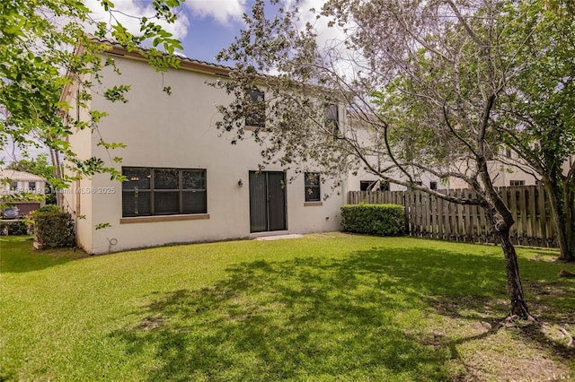 3809 Aspen Leaf Dr, Boynton Beach, FL 33436 - rear view of house featuring stucco siding