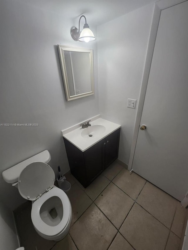 4150 NW 90th Ave Unit 203, Coral Springs, FL 33065 - bathroom featuring tile patterned floors and vanity