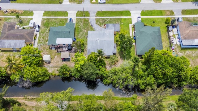 886 Camellia Dr, Royal Palm Beach, FL 33411 - aerial view of residential area with a large body of water