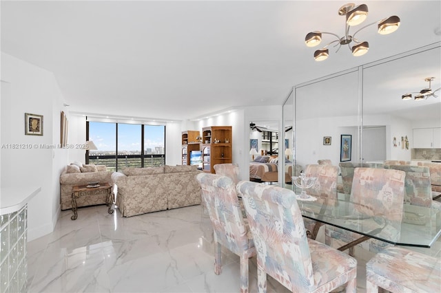3530 Mystic Pointe Dr Unit 2108, Aventura, FL 33180 - dining room with a chandelier