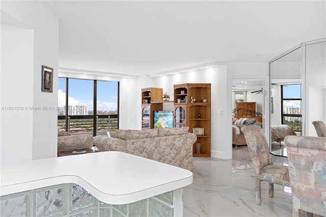 3530 Mystic Pointe Dr Unit 2108, Aventura, FL 33180 - living area with healthy amount of natural light and light marble finish floors