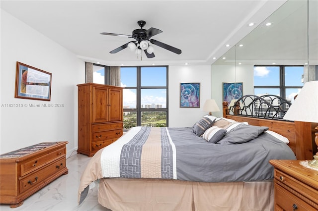 3530 Mystic Pointe Dr Unit 2108, Aventura, FL 33180 - bedroom featuring recessed lighting, light marble finish floors, and floor to ceiling windows