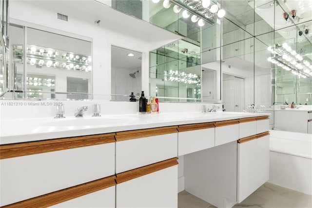 3530 Mystic Pointe Dr Unit 2108, Aventura, FL 33180 - bathroom with double vanity, marble finish floors, and a bath