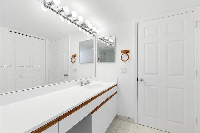 3530 Mystic Pointe Dr Unit 2108, Aventura, FL 33180 - bathroom featuring vanity, tile patterned floors, and a closet