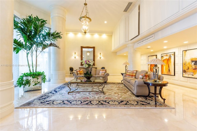 3530 Mystic Pointe Dr Unit 2108, Aventura, FL 33180 - living room featuring ornate columns, a decorative wall, marble tiled floors, and ornamental molding