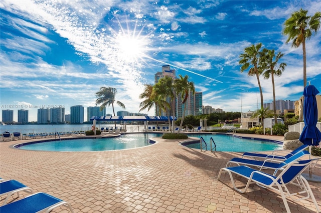 3530 Mystic Pointe Dr Unit 2108, Aventura, FL 33180 - community pool with a patio