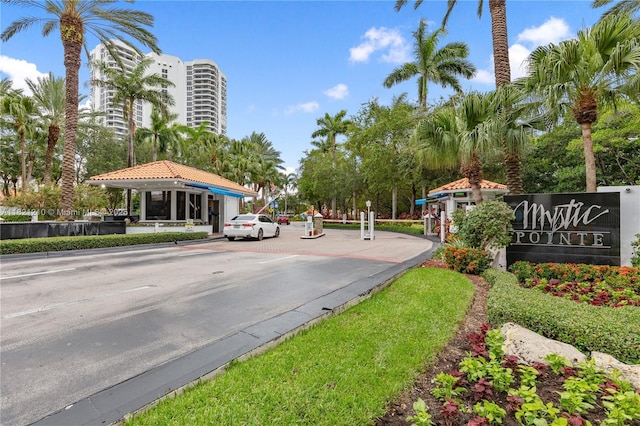 3530 Mystic Pointe Dr Unit 2108, Aventura, FL 33180 - view of asphalt road with curbs