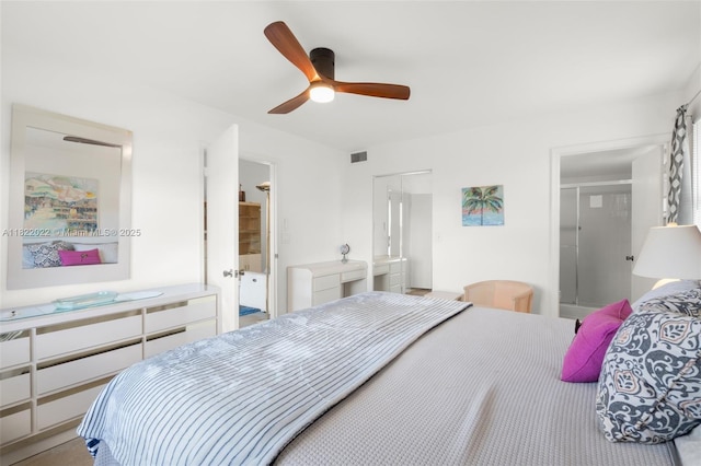 3001 Holiday Springs Blvd Unit 201, Margate, FL 33063 - bedroom with connected bathroom and ceiling fan