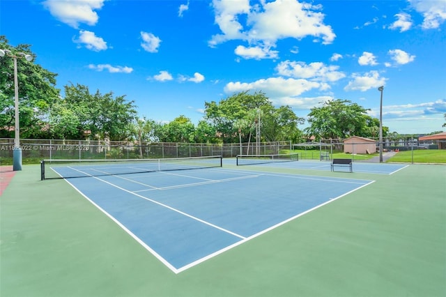 3001 Holiday Springs Blvd Unit 201, Margate, FL 33063 - view of tennis court with community basketball court