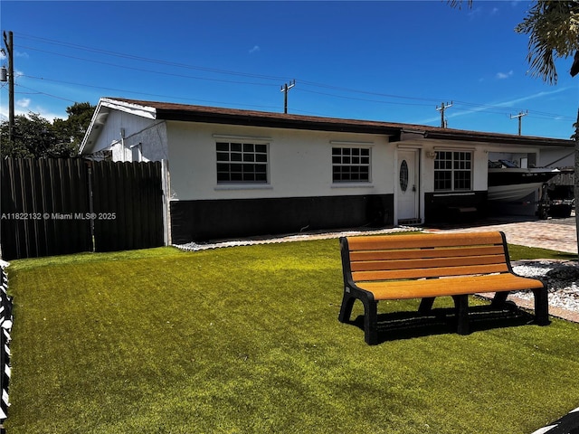 7151 Pershing St, Hollywood, FL 33024 - rear view of property with stucco siding