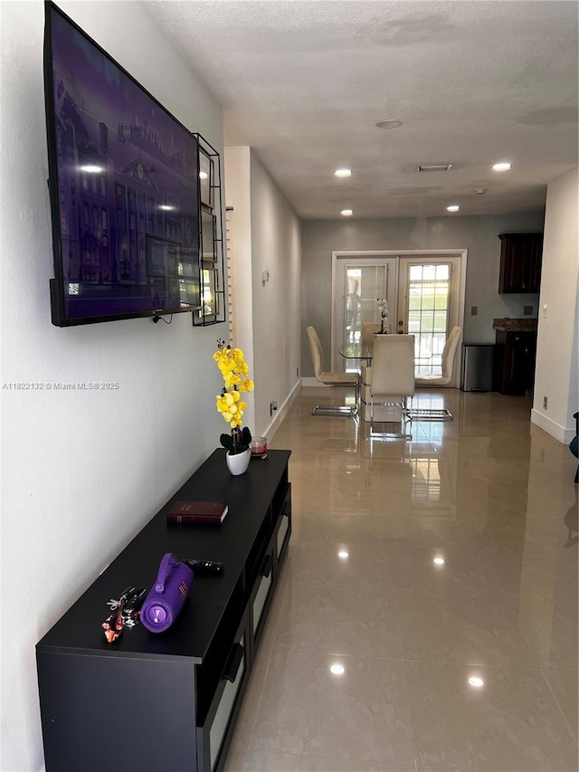 7151 Pershing St, Hollywood, FL 33024 - hall featuring tile patterned flooring and baseboards