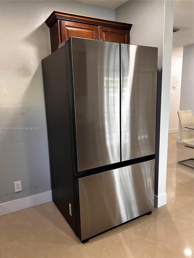7151 Pershing St, Hollywood, FL 33024 - detailed view of freestanding refrigerator and baseboards