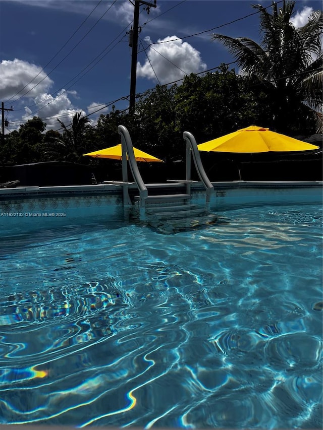 7151 Pershing St, Hollywood, FL 33024 - outdoor pool featuring a water slide